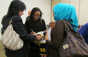 Photo caption: Heather Williams signed her book, “Self-Taught: African American Education in Slavery and Freedom,” for LEO lecturer II Sharon Werner and student Afrah Alzayadi. Williams, professor of history at University of North Carolina, was on campus Tuesday to lead this semester’s “A Conversation on Race.”