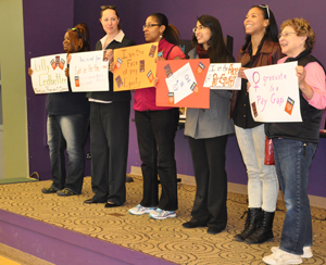Students demonstrate for pay equity.