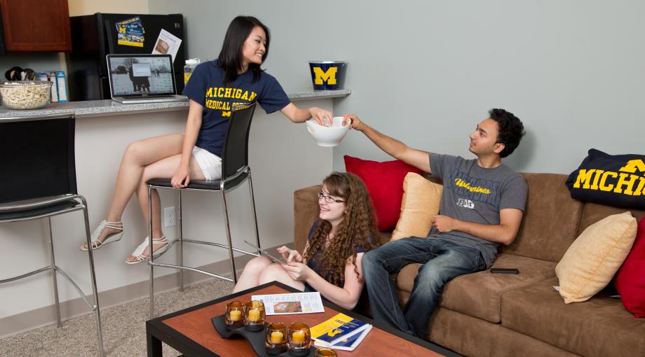 Students spending time together in their university housing room