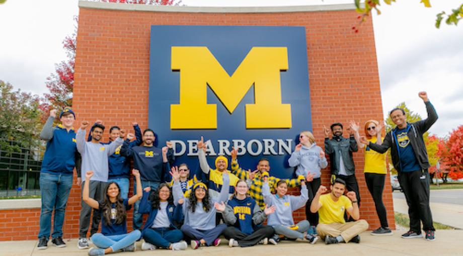 Group of students in front of M block on UM-Dearborn campus