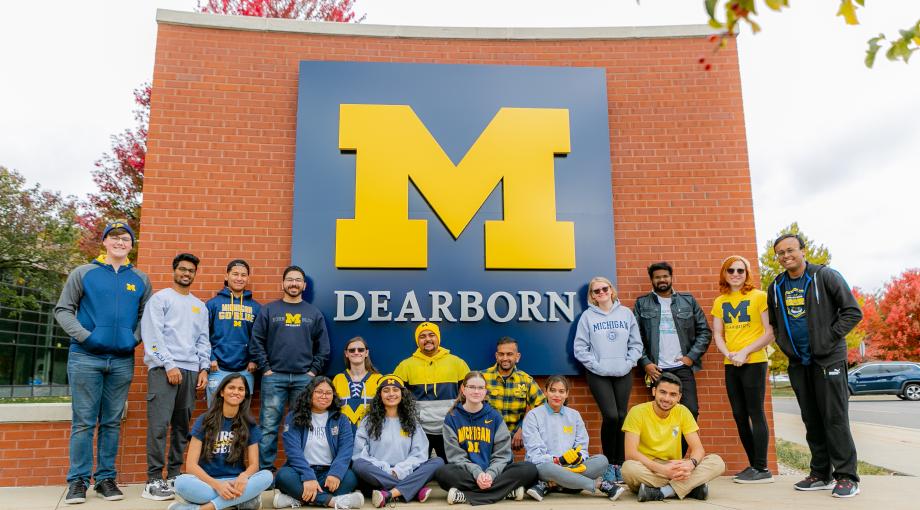 Students in front of UM-Dearborn sign