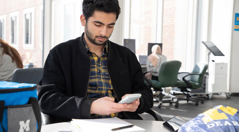 CASL student using a calculator