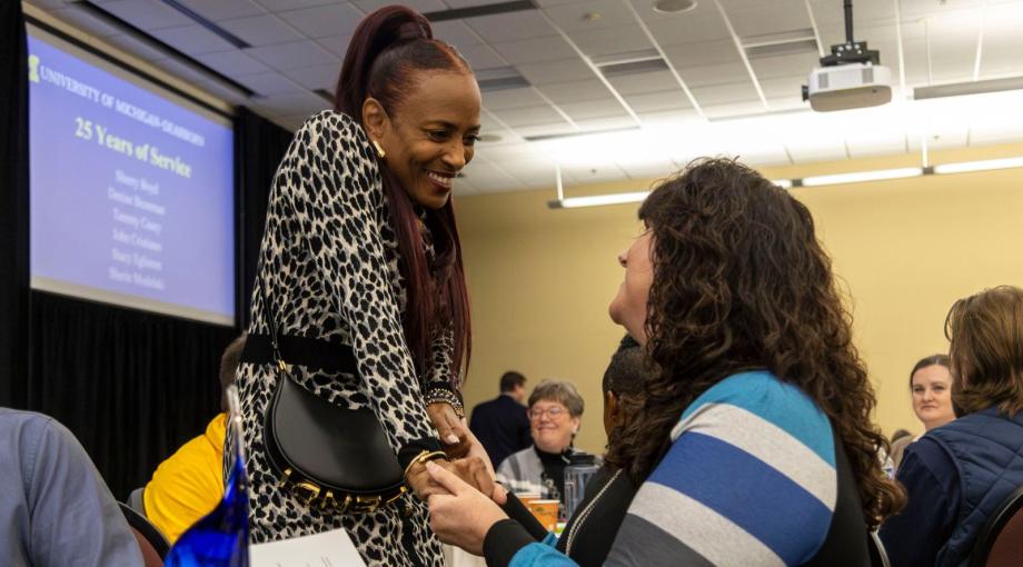 Attendees great each other at the Chancellor's Staff Recognition Awards