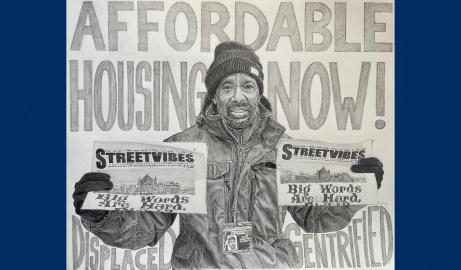 Photo of pencil on paper of "Embrace Humanity, Eradicate Homelessness"