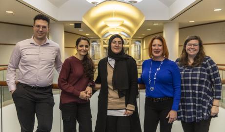 Career Coach Devin Johannis, Assistant Director of Career Services Mai Qazzaz, Career Coach Zainab Radi, Career Services Director Laurel Draudt and Senior Professional Development Program Jennifer Macleod stand for a portrait in the Fairlane Center on the UM-Dearborn campus.