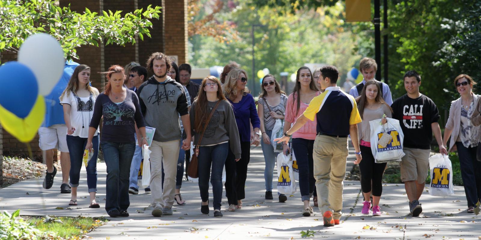 Photo of students walking of UM-Dearborn's campus