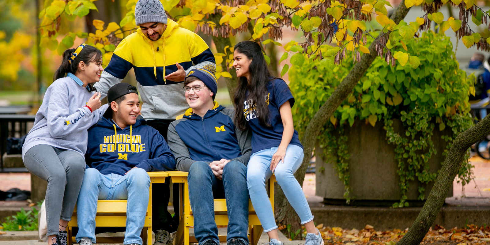 Five UM-Dearborn students sitting around chatting.
