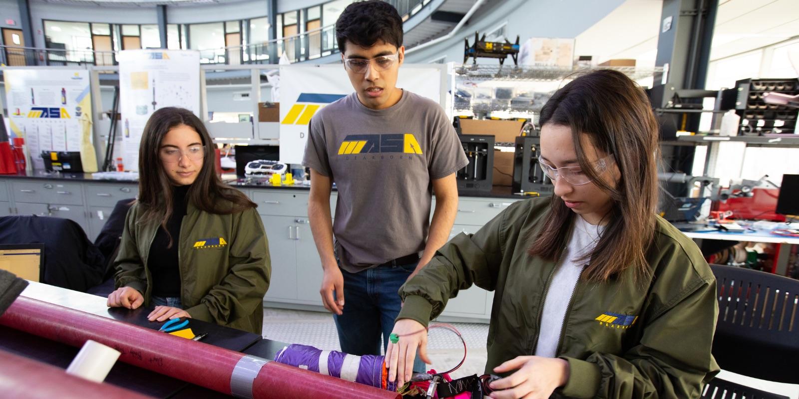MASA students working on a rocket in the IAVS