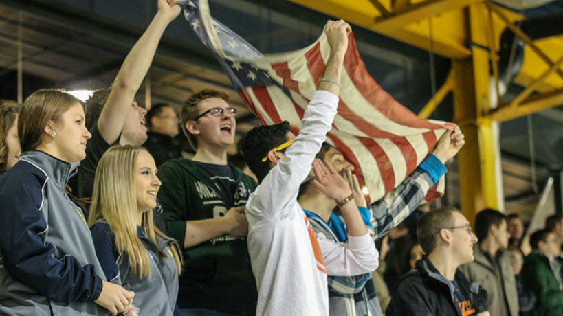 Students cheering at a sporting event