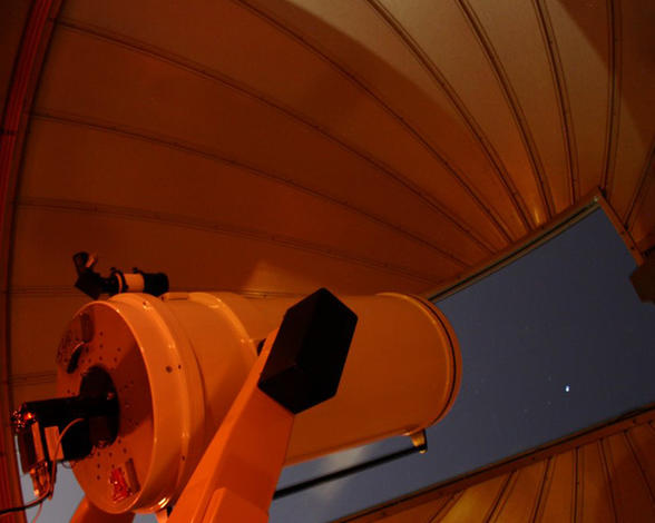 Large telescope at Dearborn Observatory at night