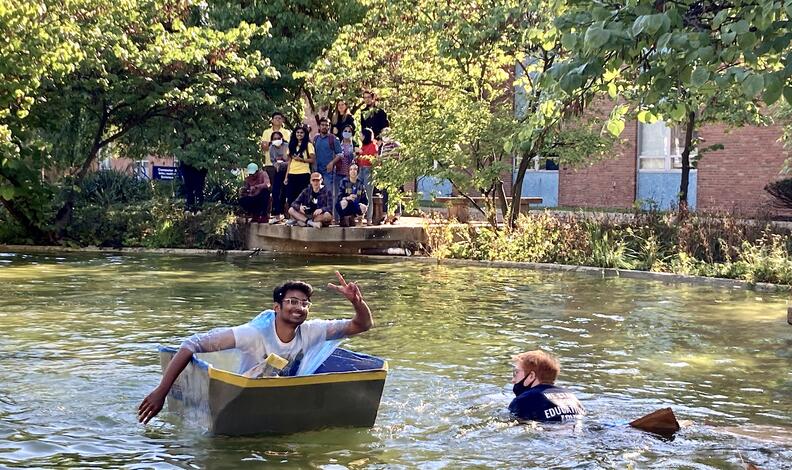 The Graduate International Student Organization's cardboard boat  took first place during a 2021 Homecoming. event.