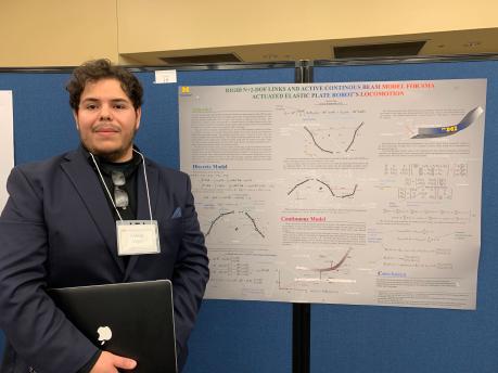 Alonso Vega with his research poster