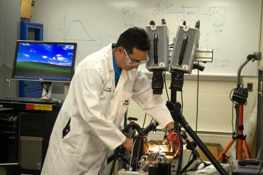 Dr. Reyes performing work in a lab