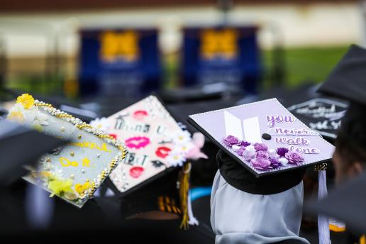 Photo of inspirational mortarboards at the Spring 2022 Commencement ceremony