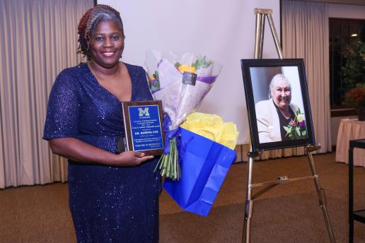 Dr. Ramona Cox with award