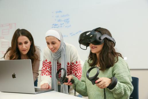 3 female students working with virtual reality