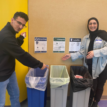 zero waste event bins and volunteers nearby