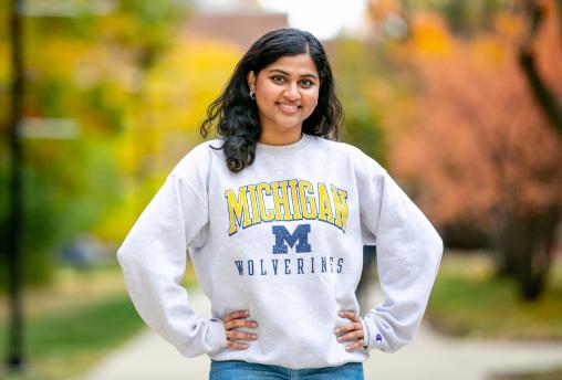 Female student wearing U-M Wolverines sweatshirt.