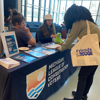 Michigan League of Conservation Voters information table in the University Center