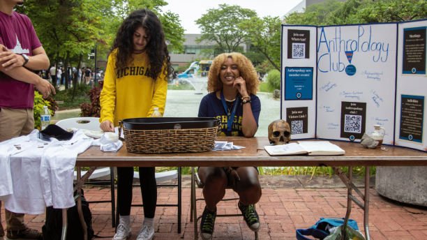 Students from the Anthropology Club host a booth at the Go Blue Bash.