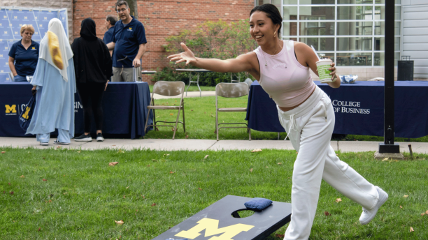 Student play cornhole at the Go Blue Bash. 