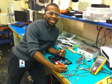 Student working in electronic lab