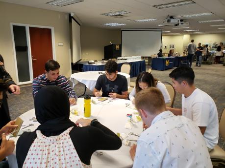 Students working around a round table