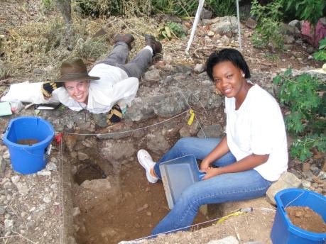Students digging at an archaeology site