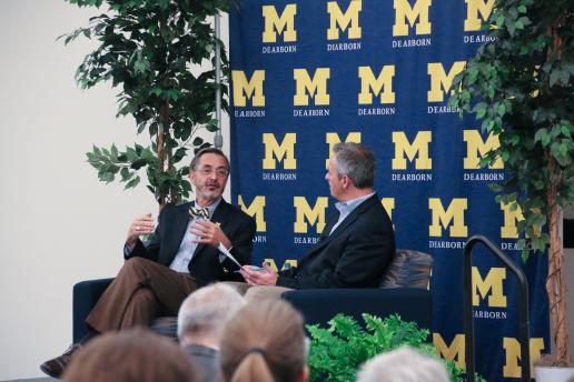 Conversation with Chancellor Grasso in front of M Block background