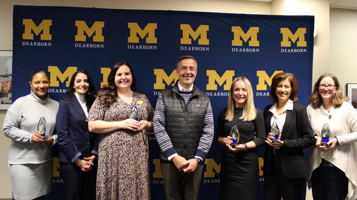 Photo of Chancellor Grasso with the 2022 Chancellor Staff Recognition Award winners
