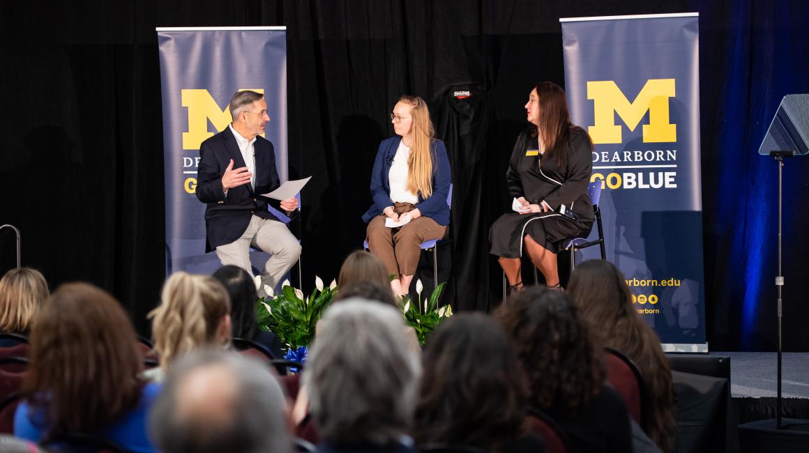 Chancellor Domenico Grasso talks with Dearborn Support Coordinator Maddie Drury (center) and Counseling and Psychological Services Director Sara Byczek. 