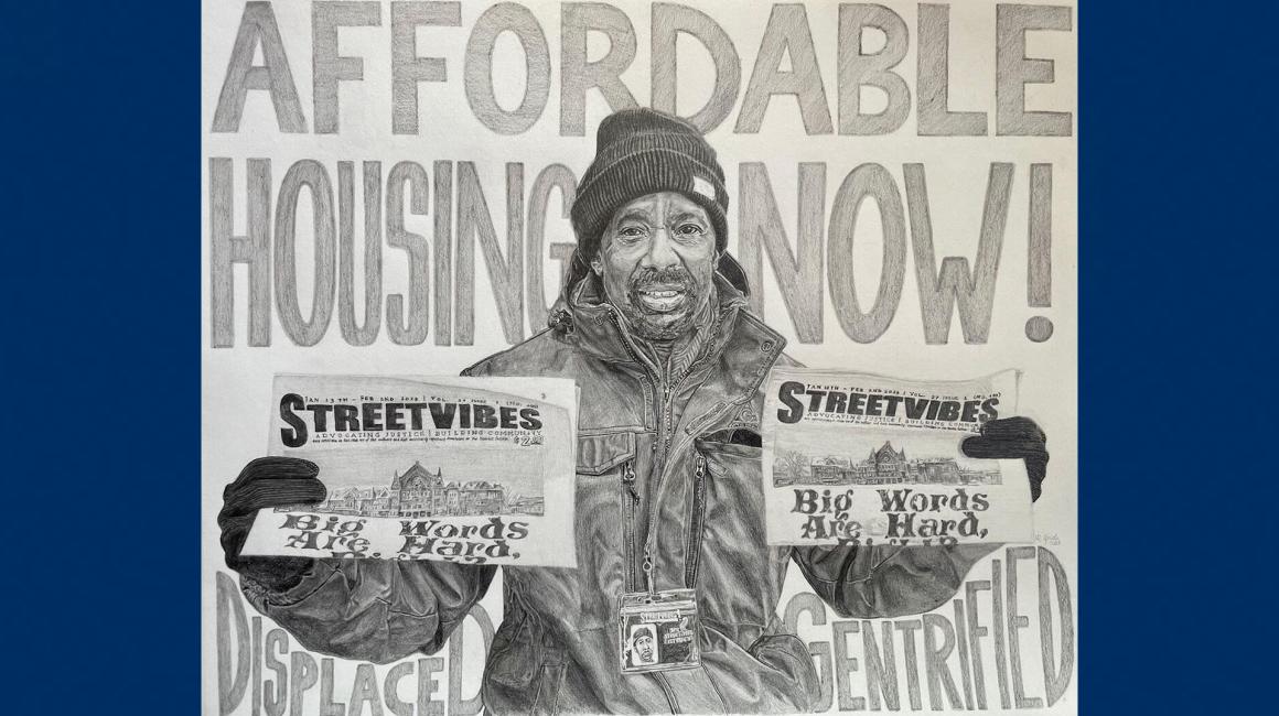 Photo of pencil on paper of "Embrace Humanity, Eradicate Homelessness"
