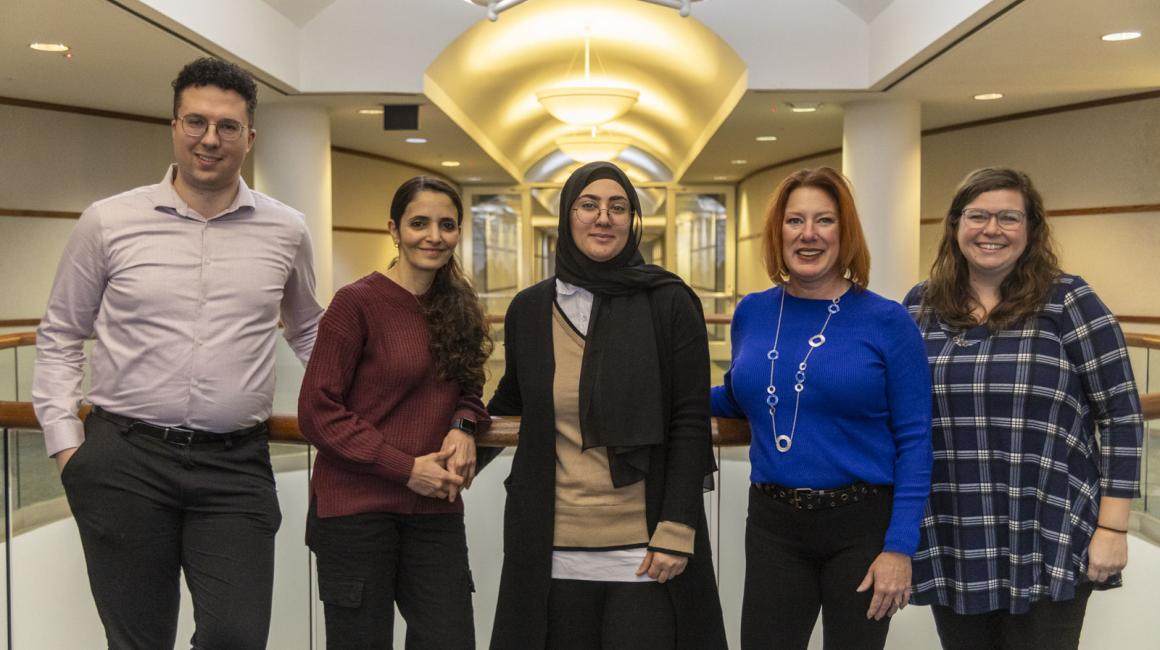 Career Coach Devin Johannis, Assistant Director of Career Services Mai Qazzaz, Career Coach Zainab Radi, Career Services Director Laurel Draudt and Senior Professional Development Program Jennifer Macleod stand for a portrait in the Fairlane Center on the UM-Dearborn campus.