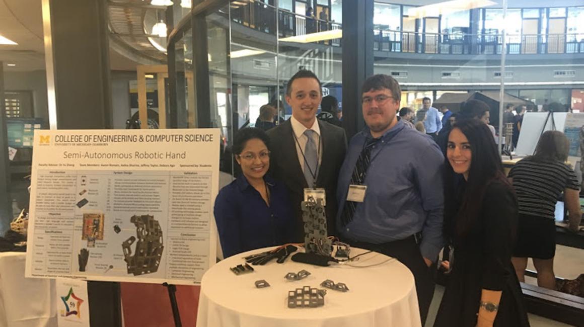  From left, Aalisa Sharma, Aaron Romain, Jeffrey Taylor and Bora Ago created “Robotic Hand” for the CECS Experiential Learning Expo. 
