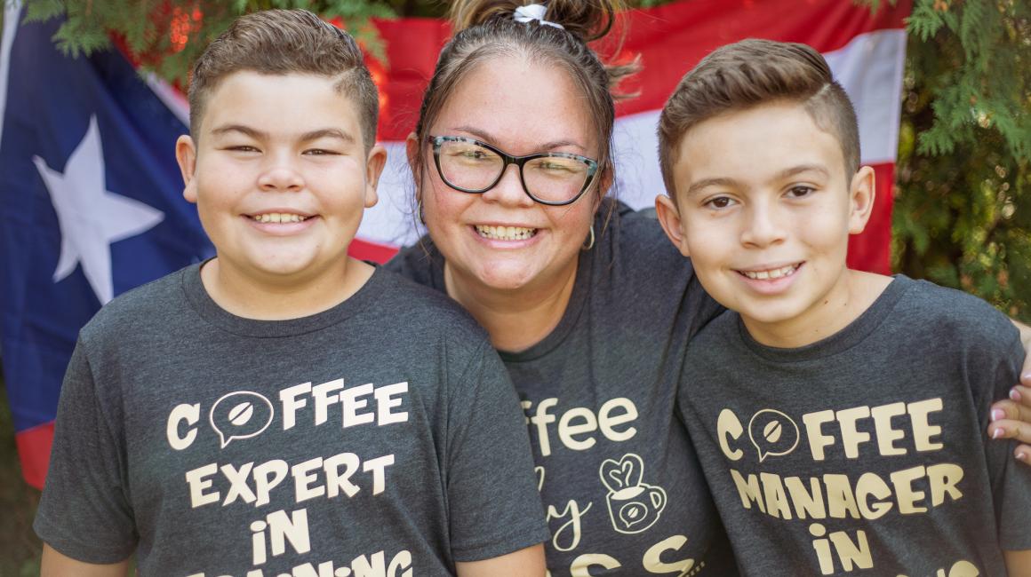 Business owner Ida Gonzalez, center, started a coffee company. She's pictured with her two children.