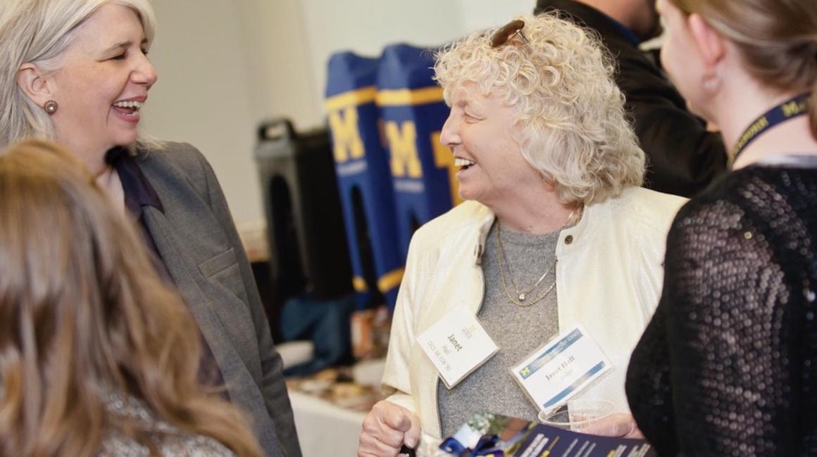  Alumna Janet Hall, center, attends a campus event in 2019. Hall speaks at Society of Women Engineers events and helped mentor UM-Dearborn students for decades. 