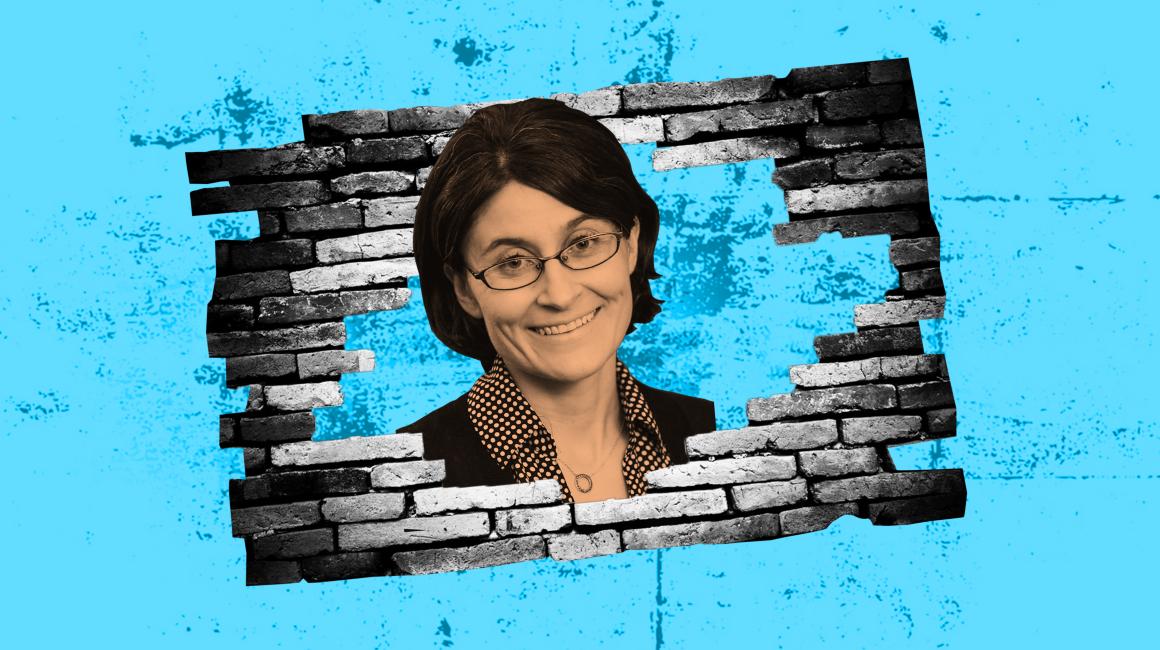 A bright blue background with a punched-out brick wall and a grayscale cutout of Kristin Polling smiling in the punch out. Kristin Polling is a white-presenting, middle-aged woman with short, ear-length brown hair and glasses.