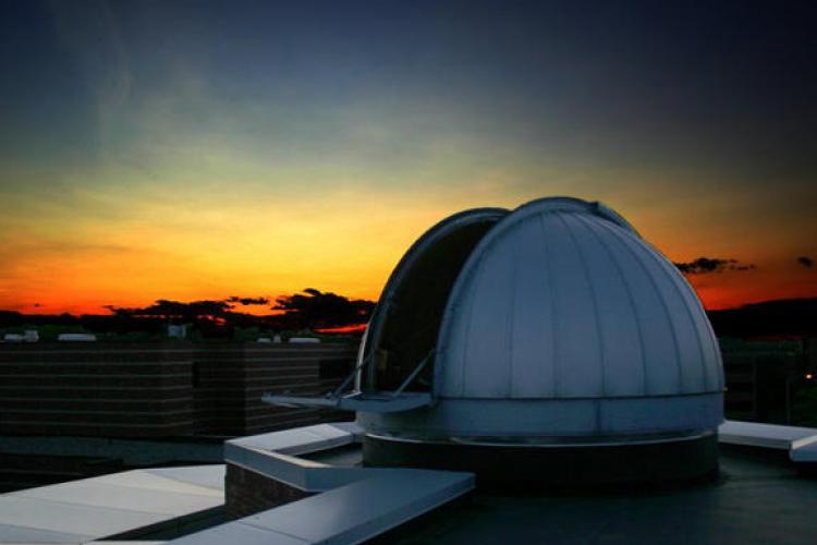 Observatory dome in the night sky