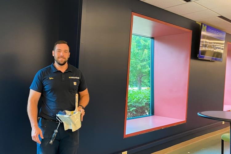 The UC got a major paint transformation. Check out the very on-brand dark blue walls. Photo by Sarah Tuxbury
