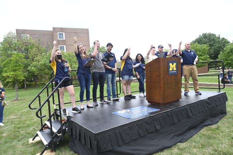 Photo of campus leaders leading the Wolverine Welcome rally.