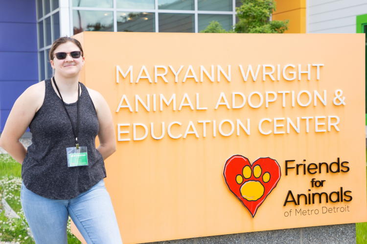 Christina Townsend in front of the Friends for Animals of Metro Detroit animal shelter