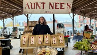 2011 COB alum Carlos Parisi at Eastern Market selling Aunt Nee's salsa