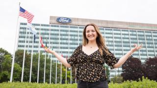 Caroline Tepper outside of the Ford Motor Company World Headquarters in Dearborn where she completed in internship over the summer. Photo by Julianne Lindsey