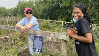 UM-Dearborn alum Daille Held, left,  and UM-Dearborn senior Sophia Hawkins spent summer 2024 Saturdays volunteering in the student-led community garden. 